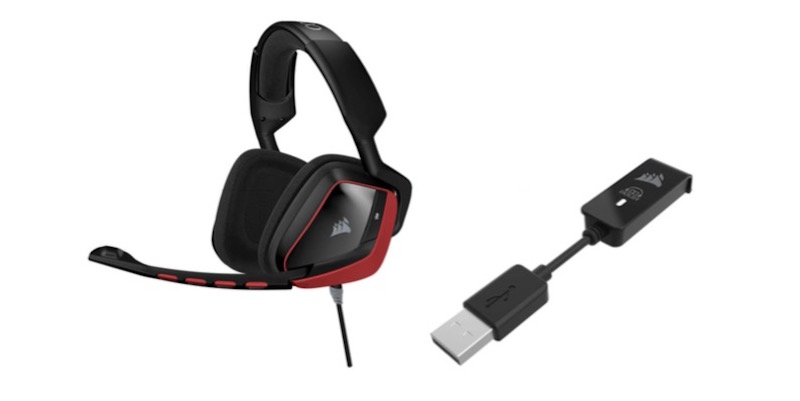 Official product shot; the USB dongle is not actually the size of the headphones.